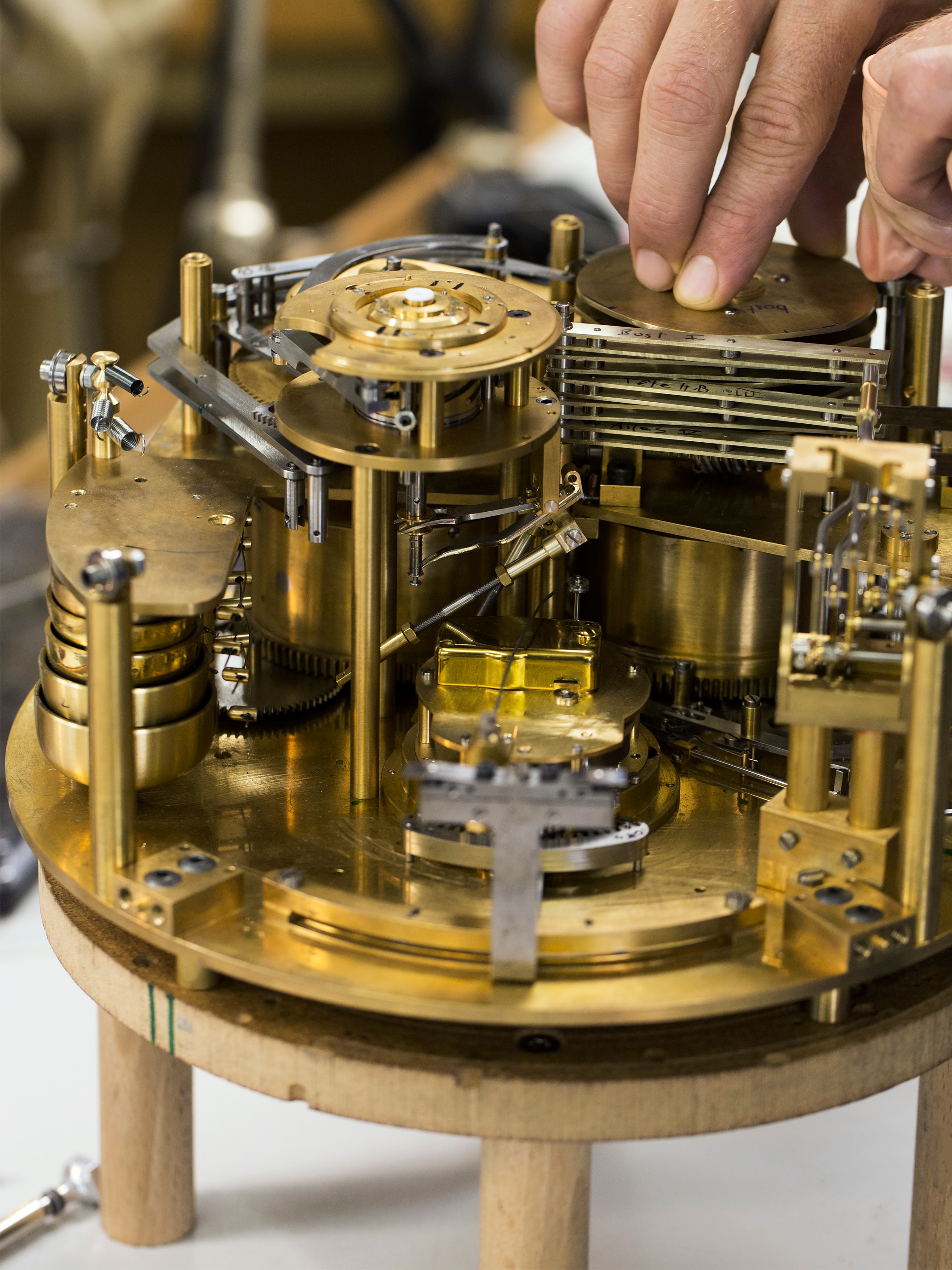 Adjustment within the automaton, visible chiming clock and watch module, Fée Ondine automaton. Extraordinary Object, Van Cleef & Arpels