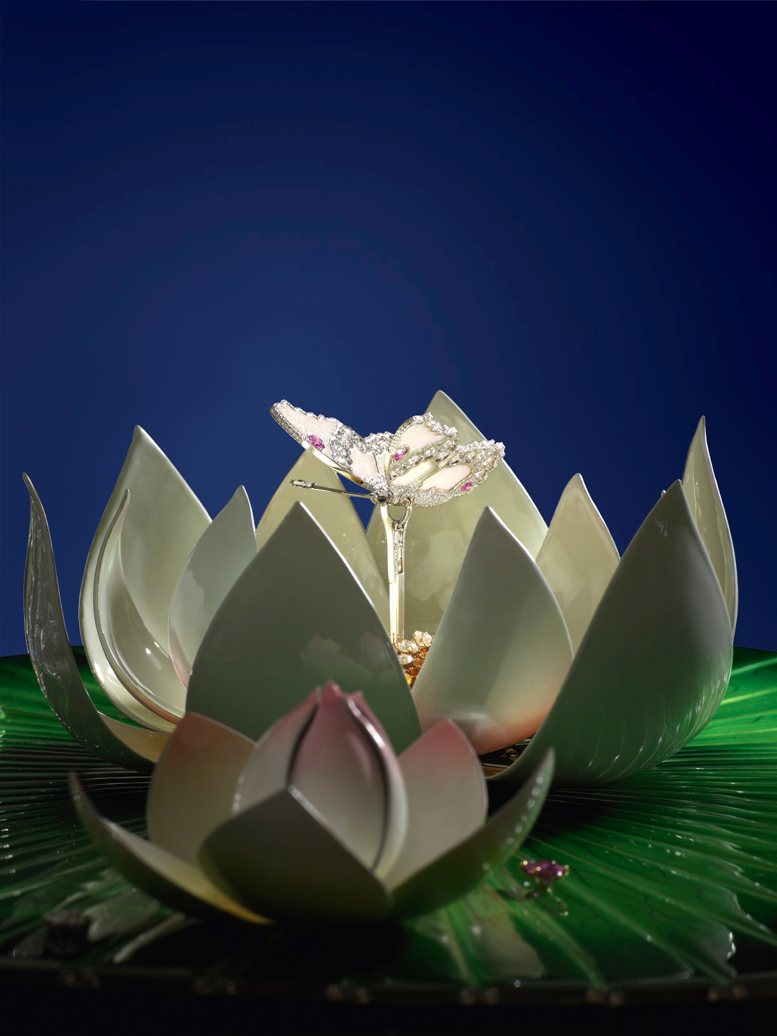 Water lily flower opening to reveal the butterfly from whit gold, diamonds, pink sapphires, Australian white opal, Fée Ondine automaton. Extraordinary Object, Van Cleef & Arpels